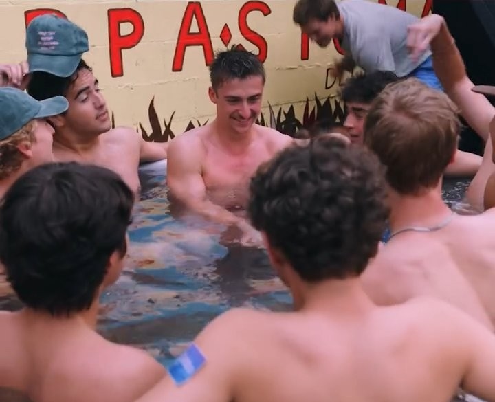 Frat guys in a cold plunge at a wellness darty